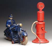 Appraisal: ARCADE GAS PUMP AND LARGE CHAMPION MOTORCYCLE The first depicting