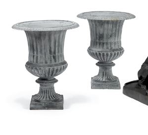 Appraisal: Set of four Neoclassical style cast iron garden urns Each