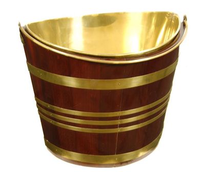 Appraisal: A Dutch mahogany and brass banded bucket of navette shape