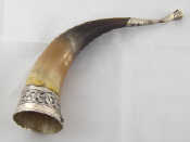 Appraisal: A Russian white metal tests silver mounted horn with niello