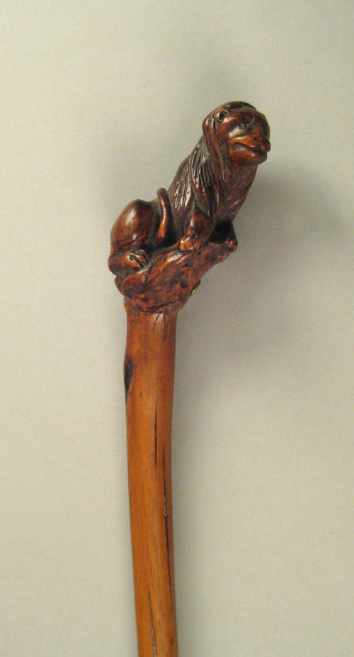 Appraisal: Walking stick with relief carved lion grip l Provenance Collection