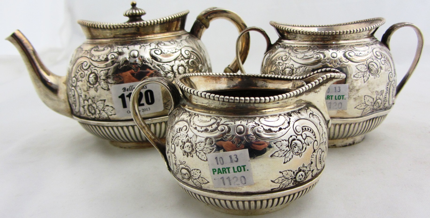 Appraisal: A Victorian silver three piece tea set comprising a teapot