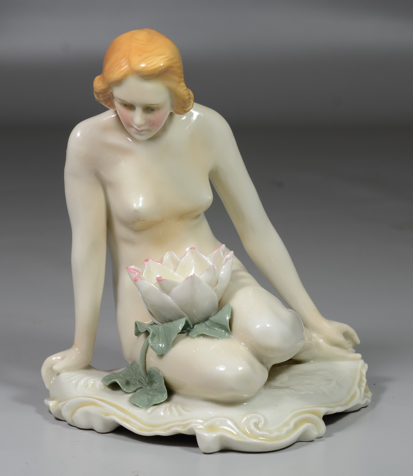 Appraisal: Karl Ens German porcelain nude Nymph with lily figurine h