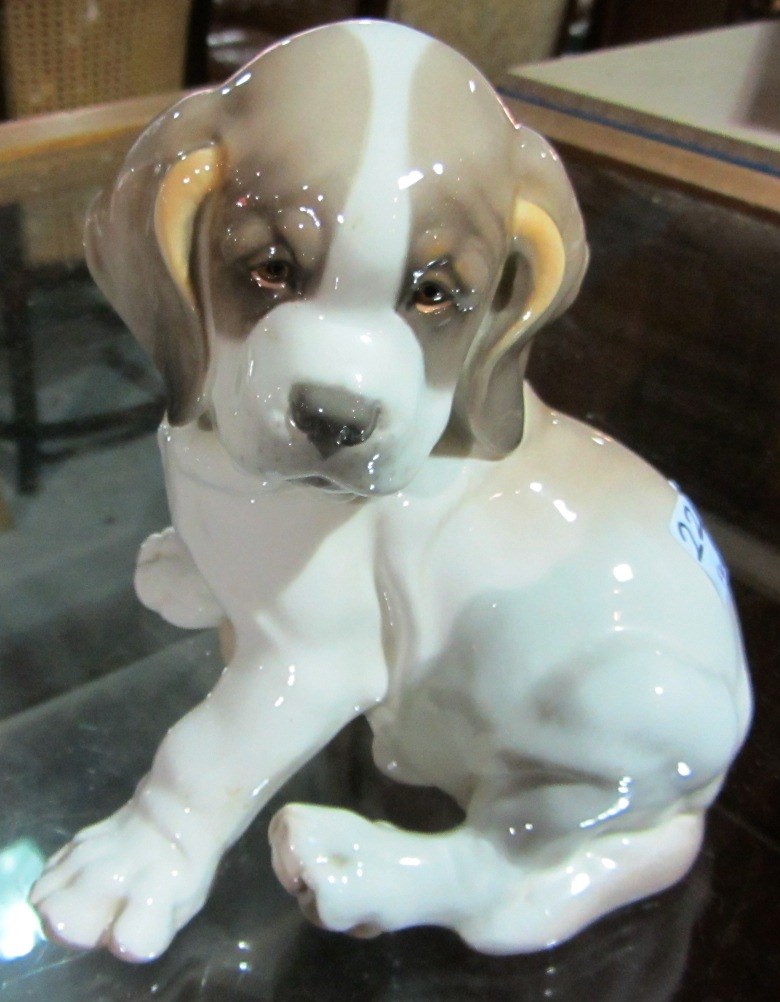 Appraisal: A Nymphenburg porcelain model of a puppy dog