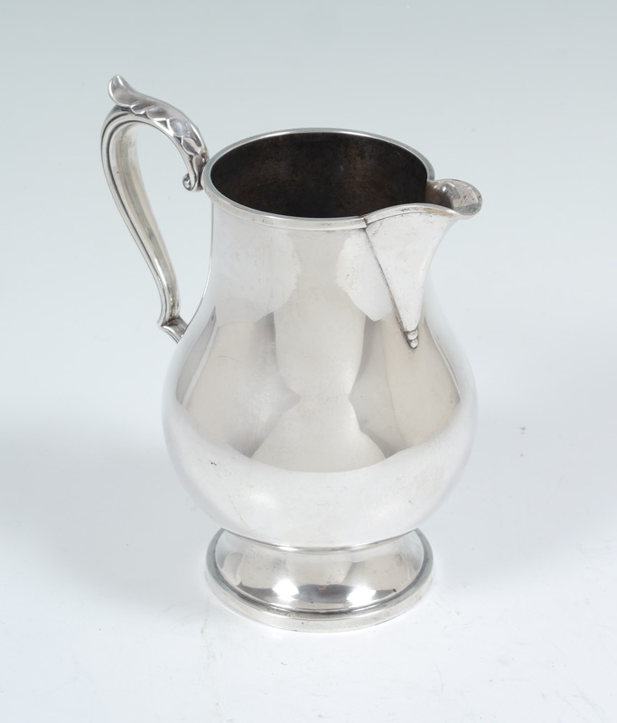 Appraisal: M FRED HIRSCH STERLING WATER PITCHER Handle with applied flora