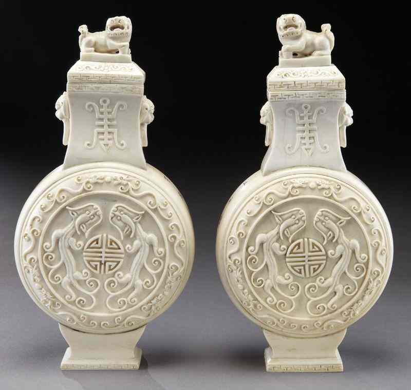 Appraisal: Pr Chinese carved ivory vases International buyers should note that