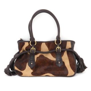 Appraisal: Adrienne Vittadini Cowhide and Leather Bag Satin interior with zipper