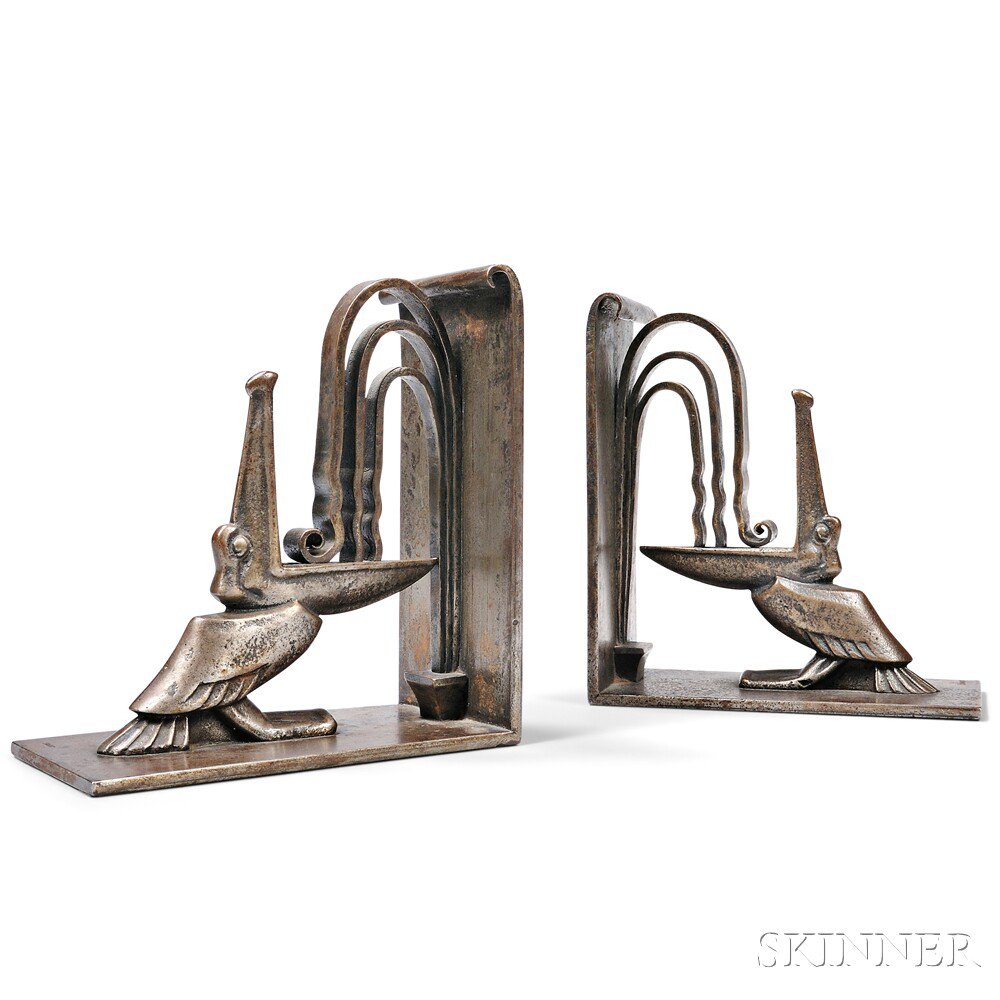 Appraisal: Edgar Brandt - Art Deco Pelican Bookends Bronze-finish wrought and