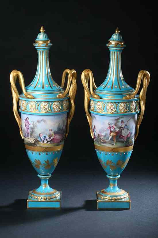 Appraisal: PAIR FRENCH S VRES-STYLE PORCELAIN URNS AND COVERS th century