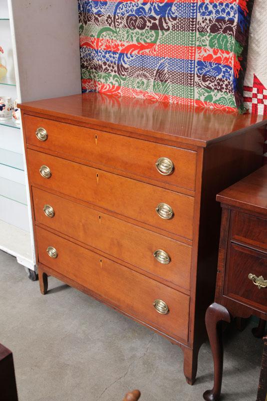 Appraisal: CHEST OF DRAWERS Cherry having four graduated drawers with oval