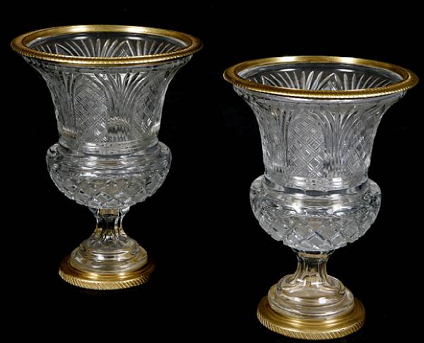 Appraisal: A pair of bronze mounted crystal urns each height in