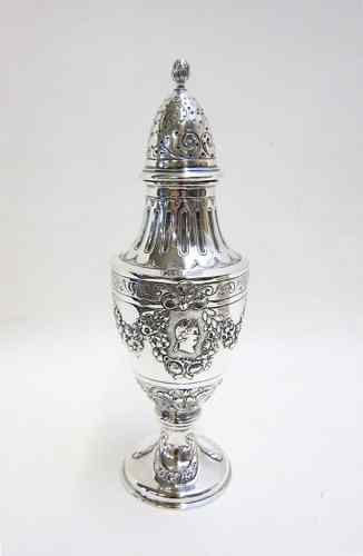 Appraisal: GERMAN FINE SILVER MUFFINEER having repousse decoration Height '' Weight