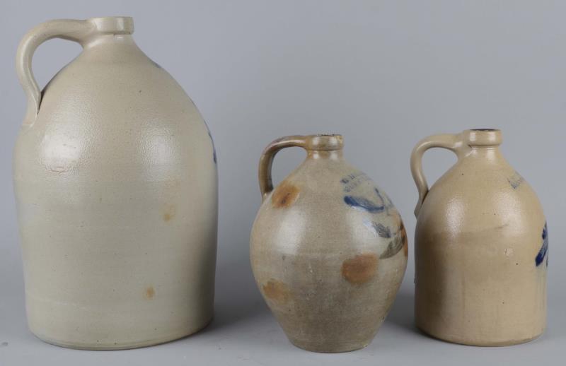 Appraisal: C Lot Of Various Stoneware Jugs Three stoneware vessels with