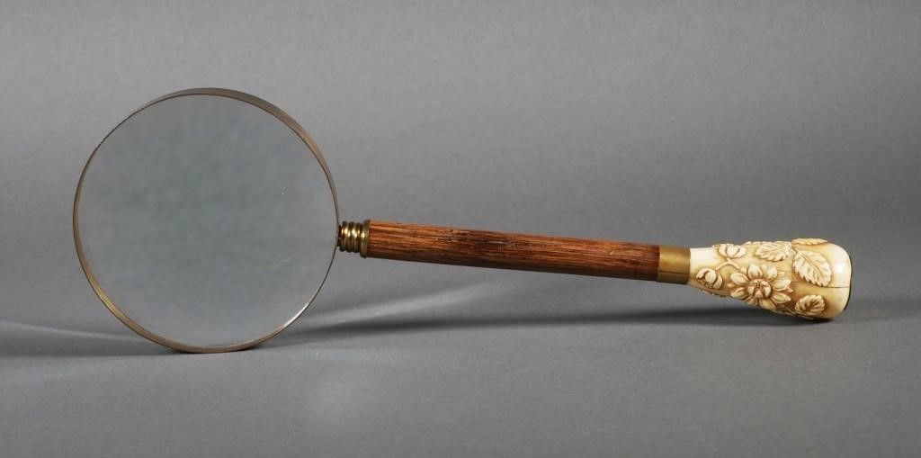 Appraisal: Antique wood and carved ivory handled magnifying glass Glass measures