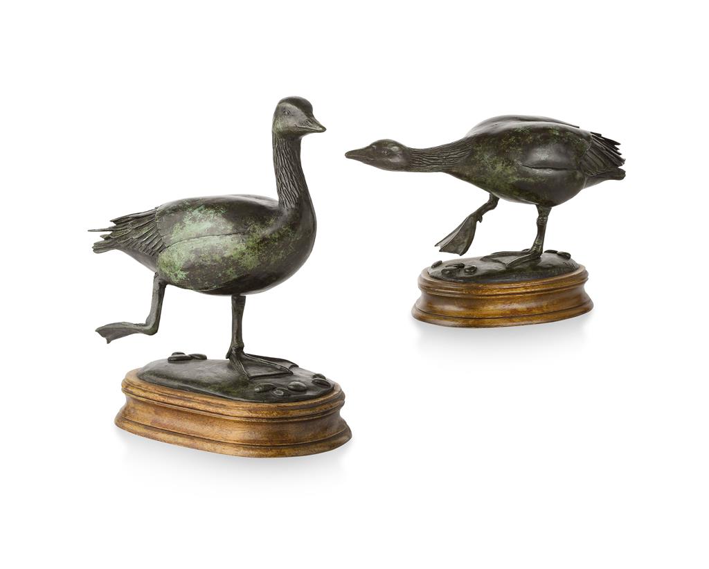 Appraisal: PATRICIA NORTHCROFT BRITISH PAIR OF BRONZE GEESE with green patina