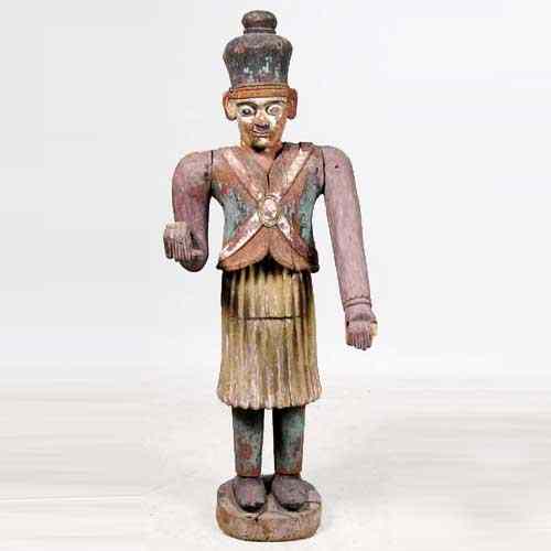 Appraisal: An Indian Raj Period Painted Teak Model of a Soldier