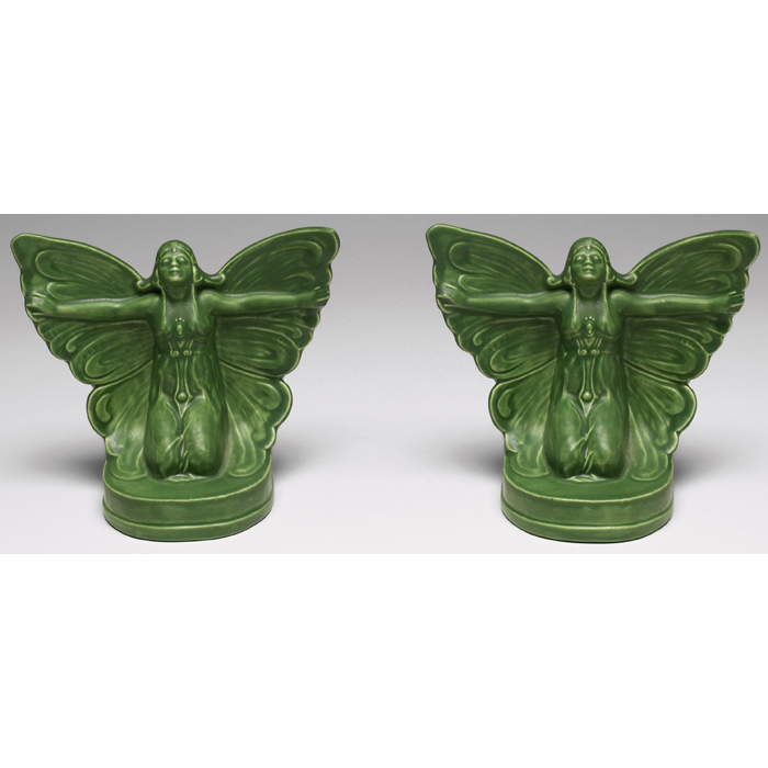 Appraisal: Unusual Art Pottery bookends pair winged figure covered in a