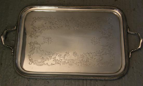 Appraisal: Silver plated twin-handled rectangular tray with engraved scrolling decoration gadrooned