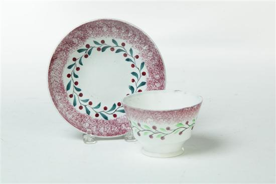 Appraisal: SPATTERWARE HANDLELESS CUP AND SAUCER England nd quarter- th century