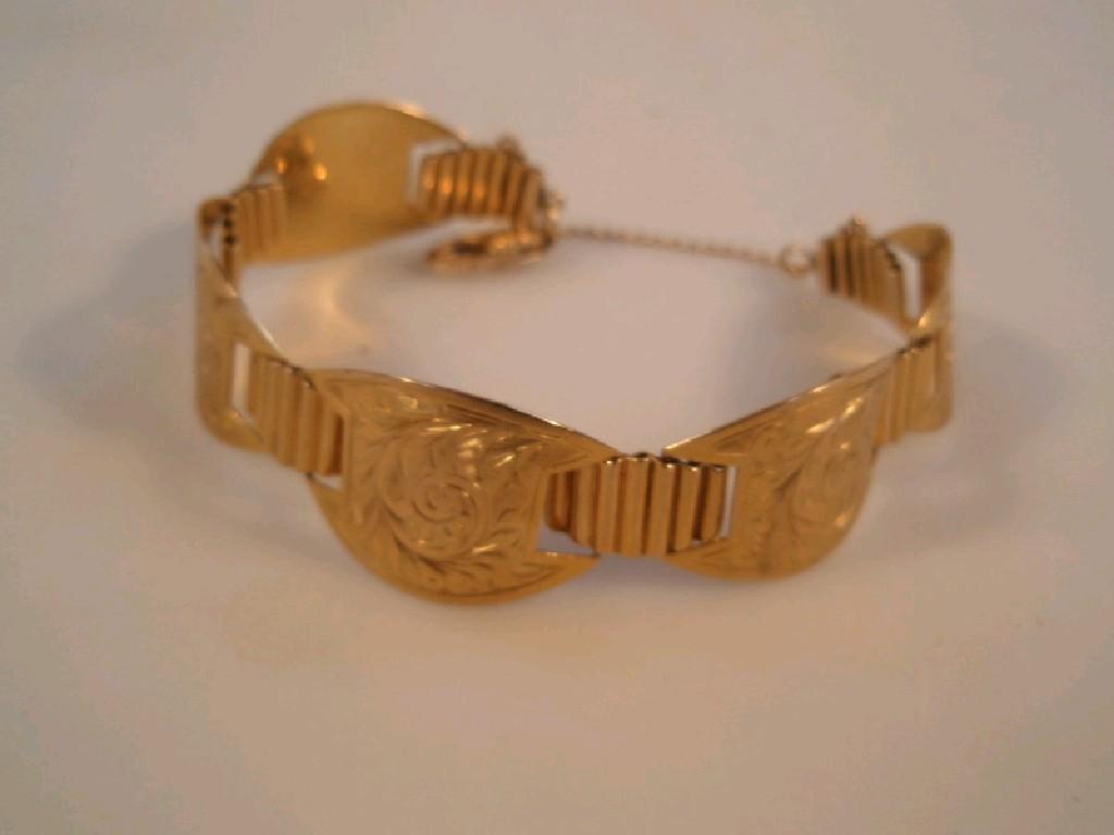 Appraisal: A bracelet a 's revival style bracelet of linked engraved