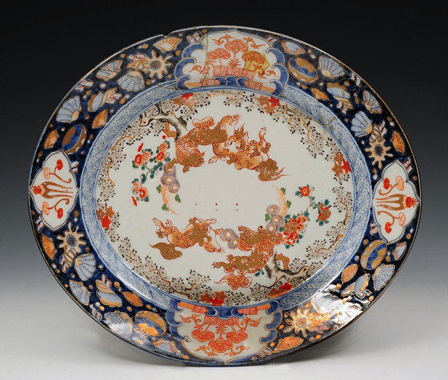 Appraisal: A JAPANESE ARITA OVAL DISH decorated in the Imari palette