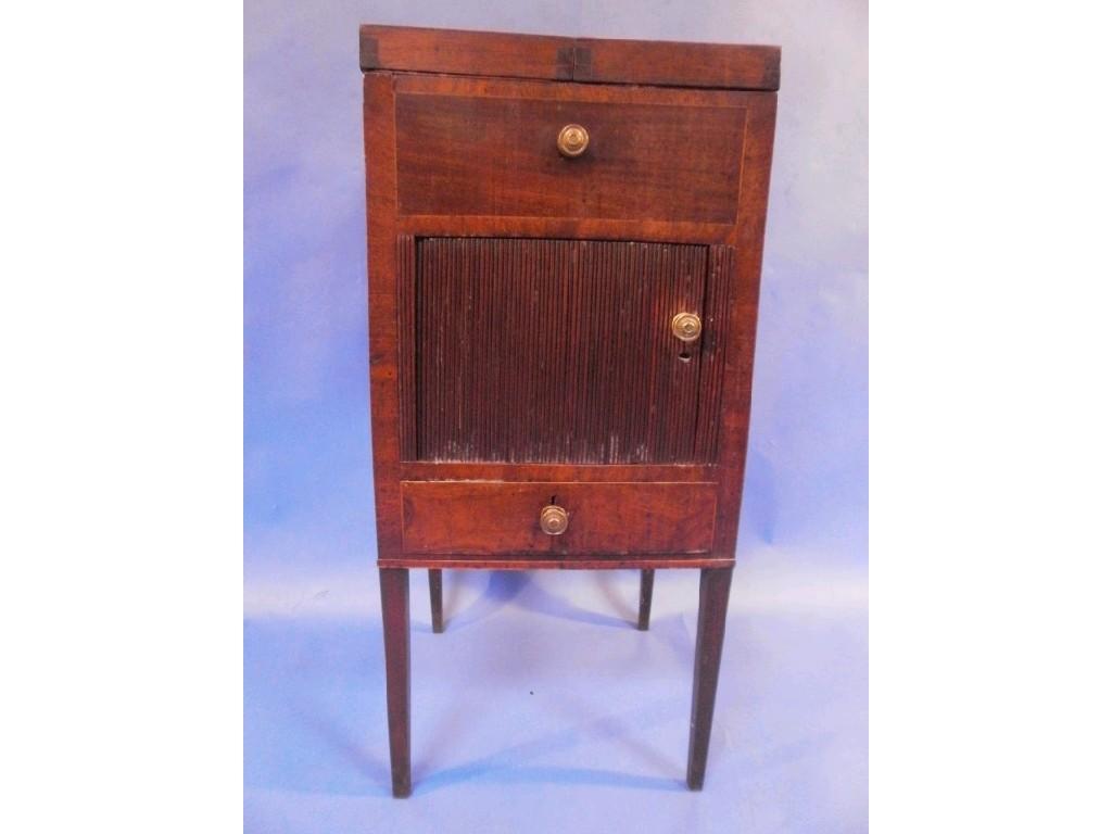 Appraisal: A George III mahogany gentleman's wash stand with tambour pot