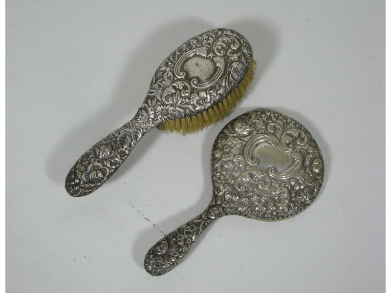 Appraisal: Gorham Sterling Repousse Hand Mirror Brush both with ornate floral