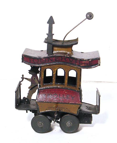 Appraisal: Toonerville Trolly Clockwork Toy Lot features a German Nifty Toonerville