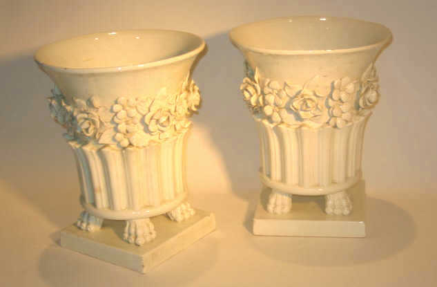 Appraisal: PAIR OF CONTINENTAL PORCELAIN JARDINIERES Allover white with flaring rims