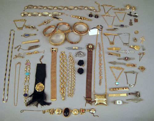 Appraisal: Group of jewelry to include tie clips bangles pins necklaces