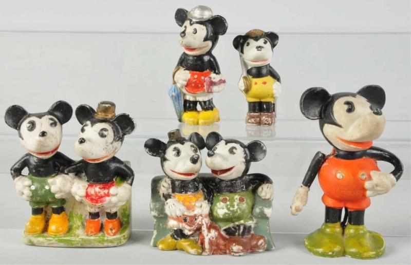 Appraisal: Lot of Bisque Disney Mickey Minnie Figures Includes two Mickey