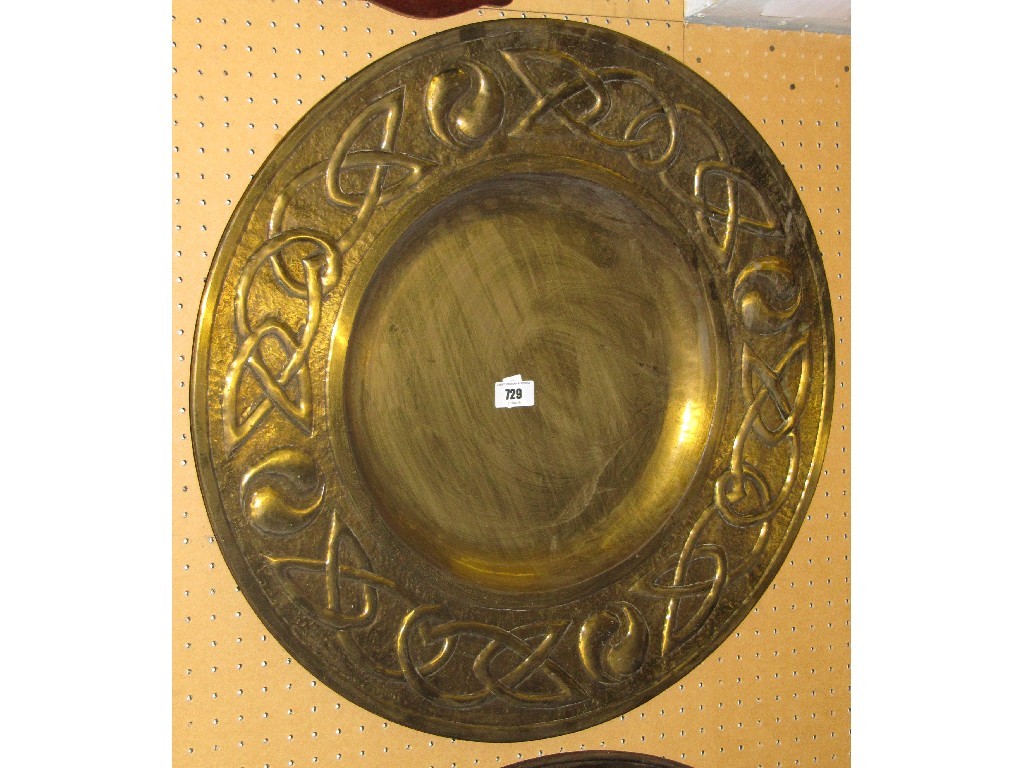 Appraisal: Lot comprising two brass chargers embossed with Celtic knot decoration