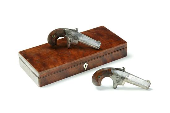 Appraisal: CASED PAIR OF COLT SECOND MODEL DERINGERS caliber '' round