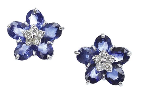 Appraisal: A PAIR OF SAPPHIRE AND DIAMOND EARRINGS Of floral cluster