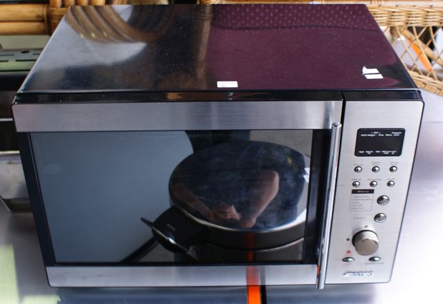 Appraisal: A Smegg stainless steel microwave