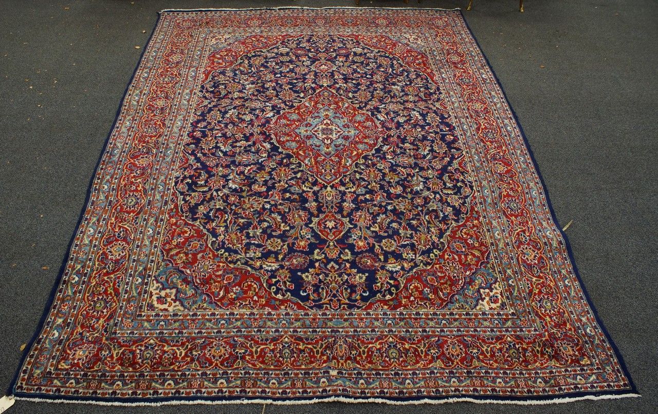 Appraisal: Persian Carpet x some wear throughout the field