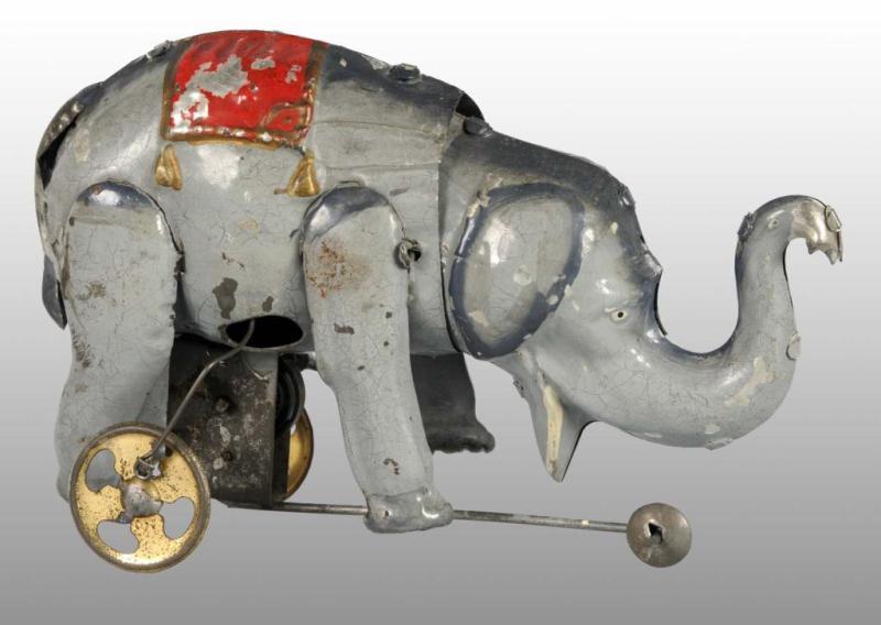 Appraisal: Tin Hand-Painted Elephant Wind-Up Toy Description German Working When wound