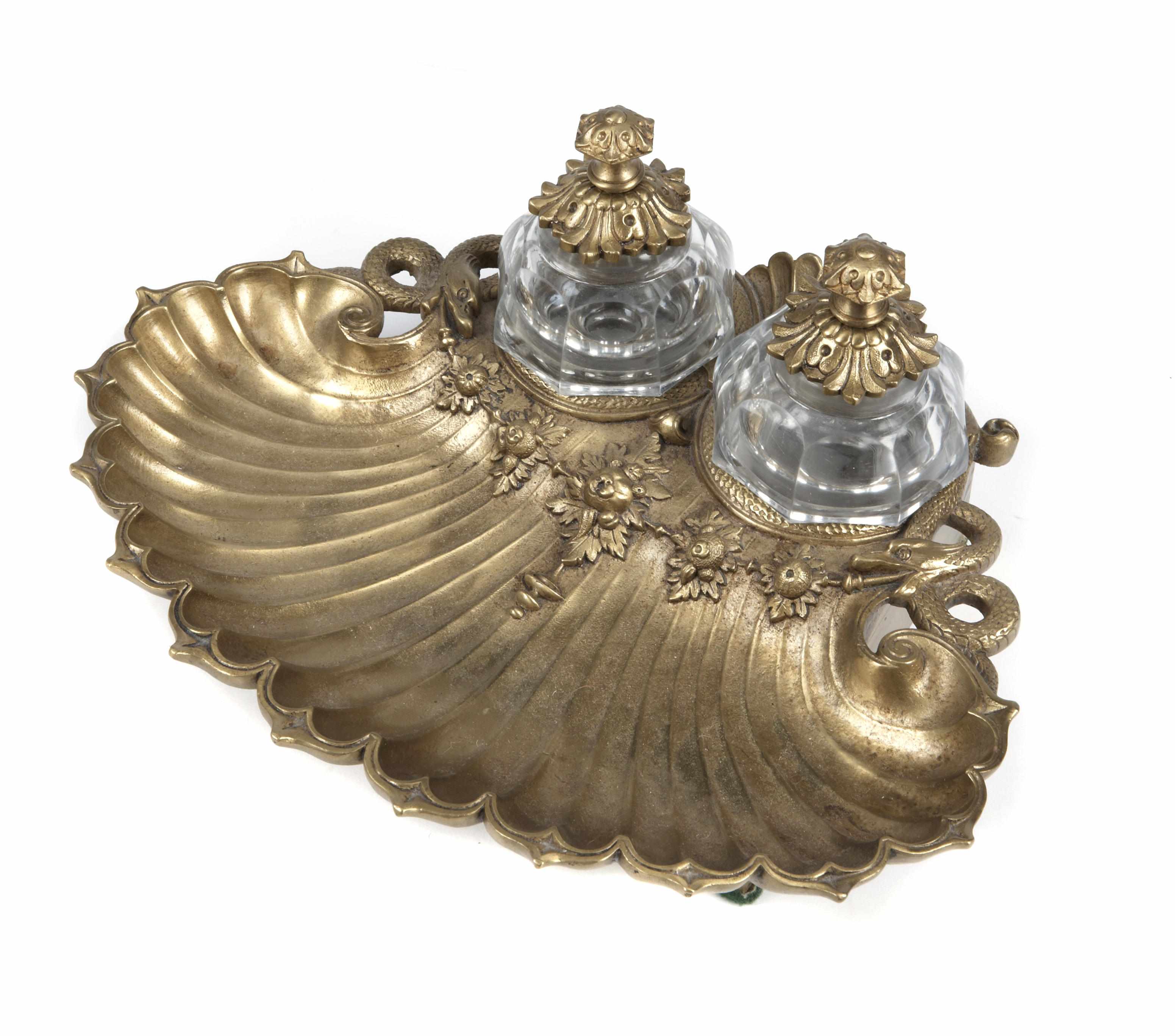 Appraisal: A French gilt bronze and cut glass shell form encrier