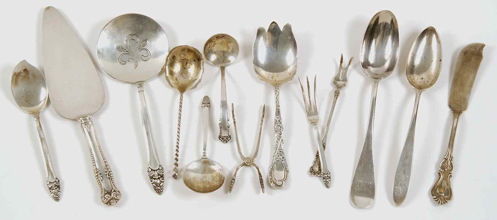 Appraisal: SEVENTEEN STERLING SILVER SERVING PIECESBy various makers Includes a hot