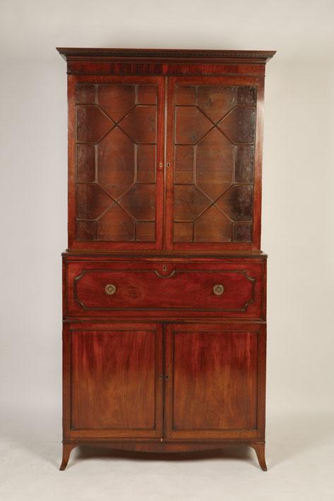 Appraisal: A GEORGE III MAHOGANY SECRETAIRE BOOKCASE the upper section with