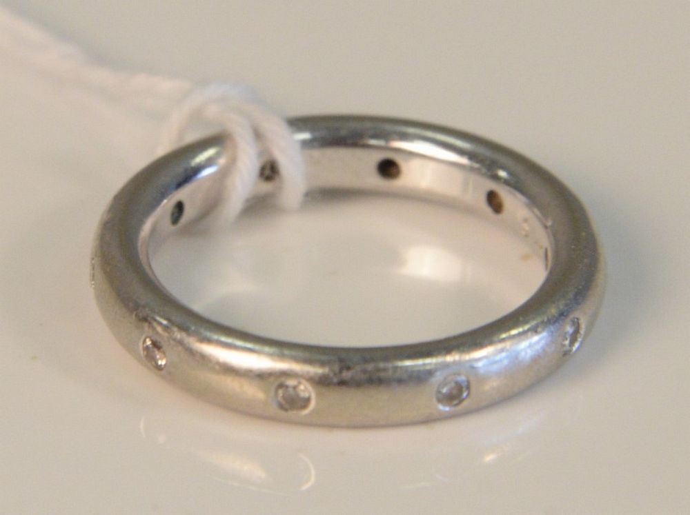 Appraisal: Karat White Gold Band set with ten small diamonds size