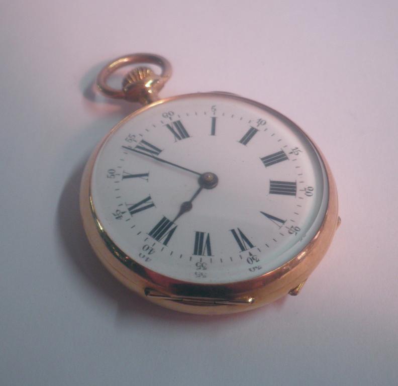 Appraisal: An ct gold Swiss open face pocket watch bezel wind