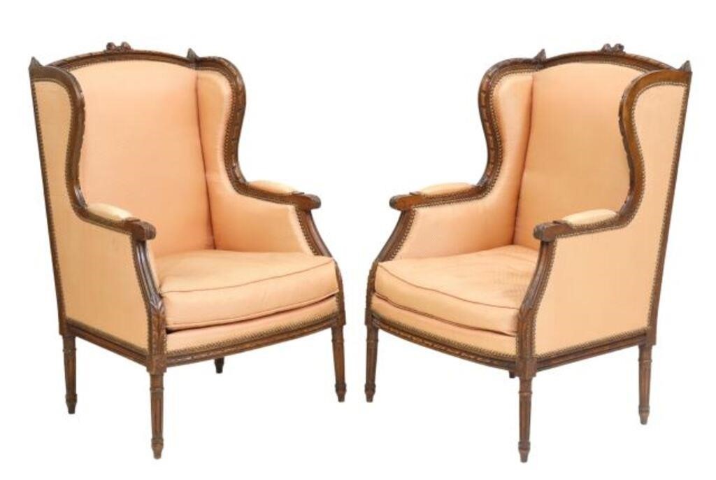 Appraisal: pair French Louis XVI style wingback armchairs th c carved