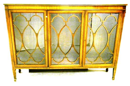 Appraisal: Classical Revival wood cabinet with triple glass doors elliptical mullions