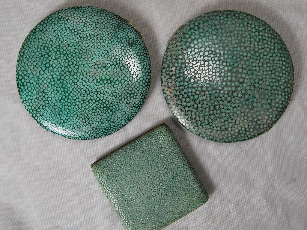 Appraisal: Two circular shagreen-covered powder compacts and a small square example