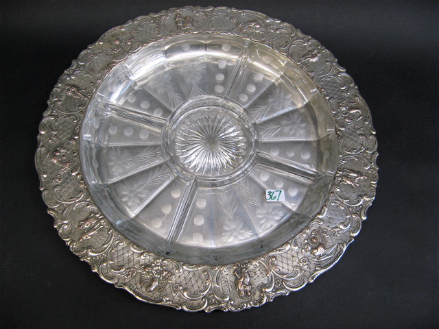 Appraisal: ROUND SILVER PLATED SERVING TRAY fitted with etched glass divided