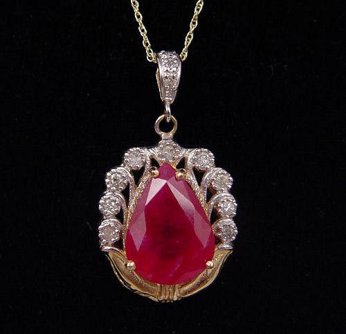 Appraisal: RUBY PENDANT K yellow gold pendant contains one pear shaped