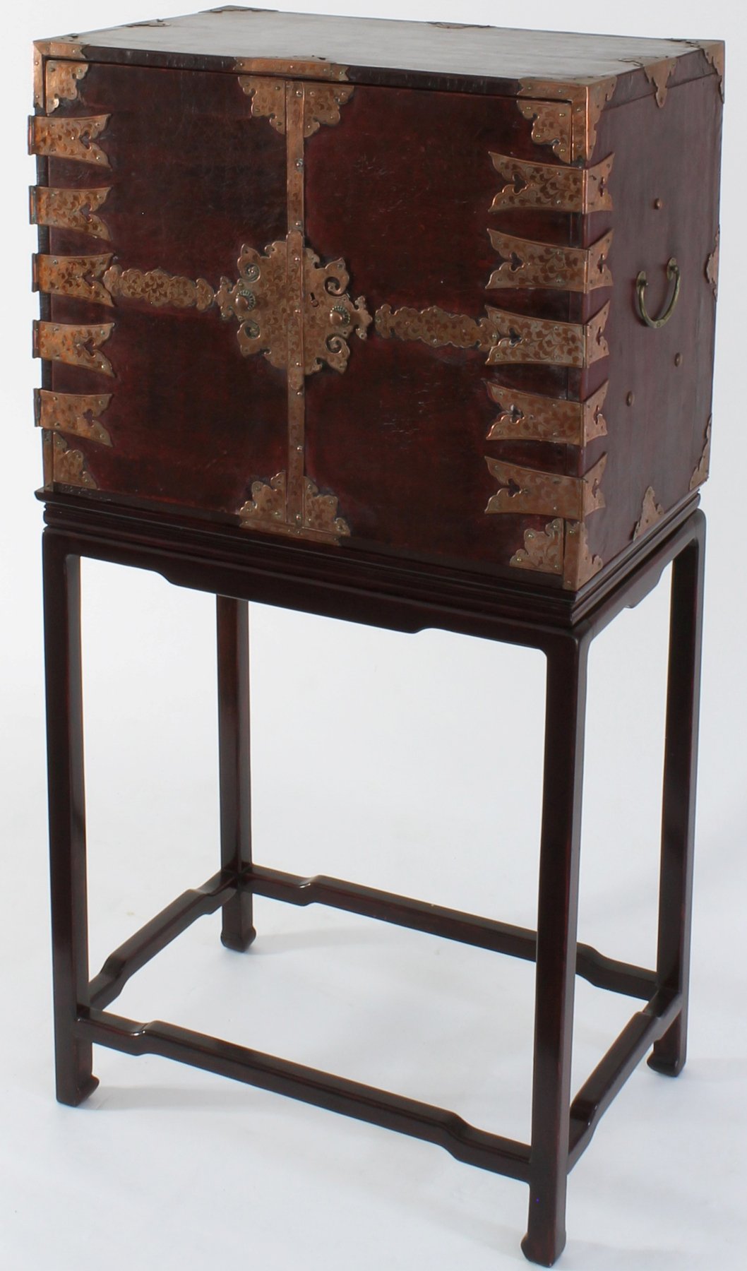 Appraisal: A Chinese leather covered cabinet on stand the two cabinet