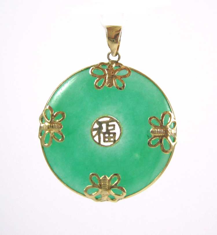 Appraisal: CHINESE JADE AND FOURTEEN KARAT GOLD PENDANT with a round