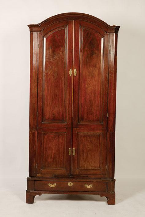 Appraisal: AN ANGLO-DUTCH MAHOGANY CORNER CUPBOARD with two arched topped twin